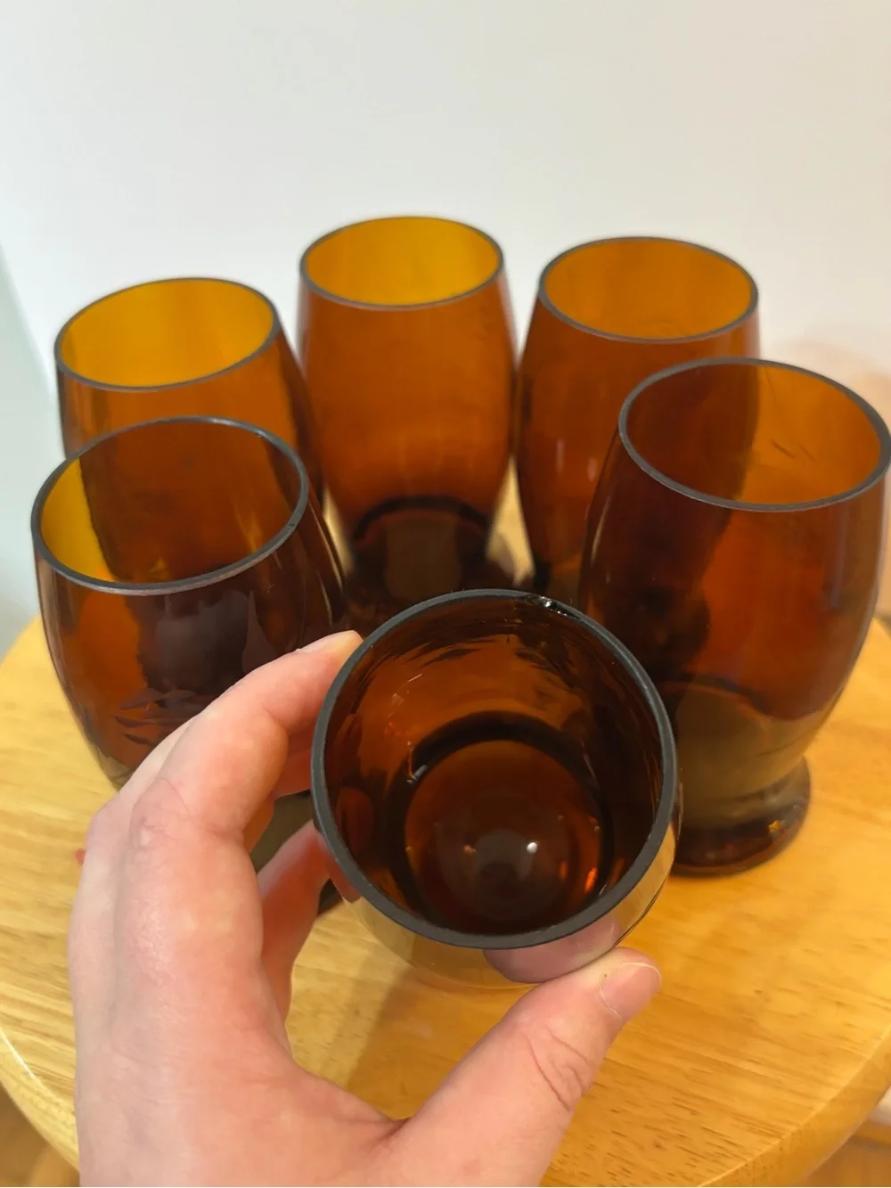 A set of six upcycled vintage amber beer bottle drinking glasses